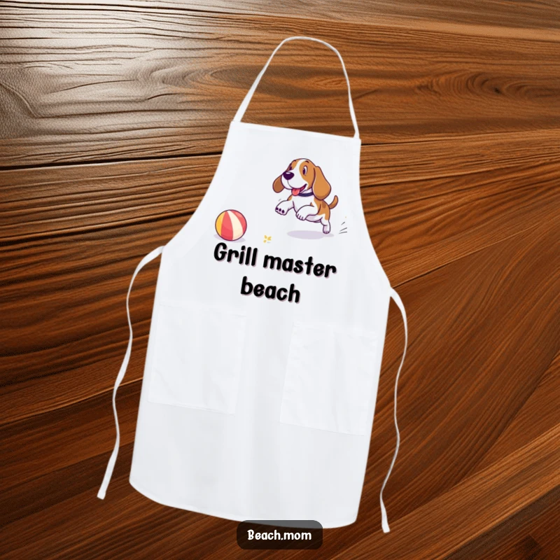 Funny Basset Hound apron with a dog playfully chasing a beach ball on the shore, adding a humorous touch to cooking and beach activities.