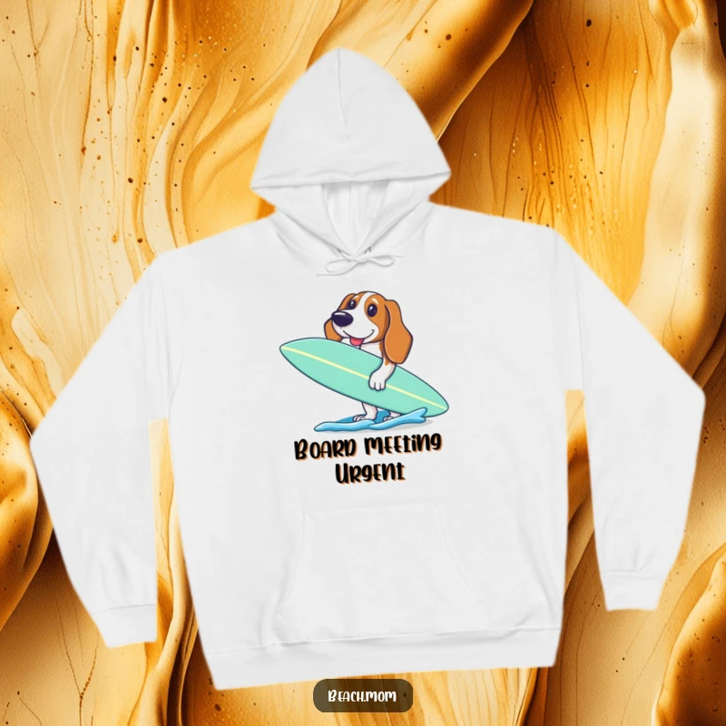 Funny Basset Hound hoodie with an excited dog holding a surfboard, geared up and ready to paddle into the waves.