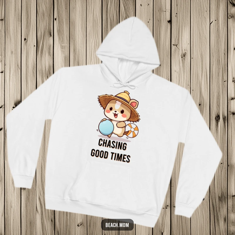 Funny animal character wearing a straw hat chasing a beach ball, featured on a warm hoodie, offering cozy comfort and beachy humor.