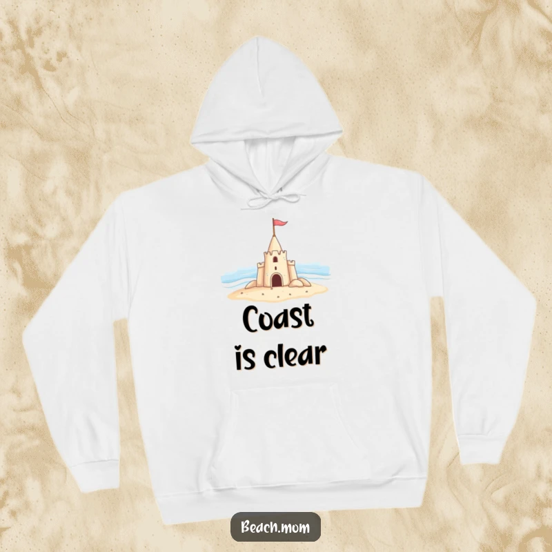 Funny hoodie showing a joyful sandcastle, flag in hand, enthusiastically waving hello to the big blue ocean.