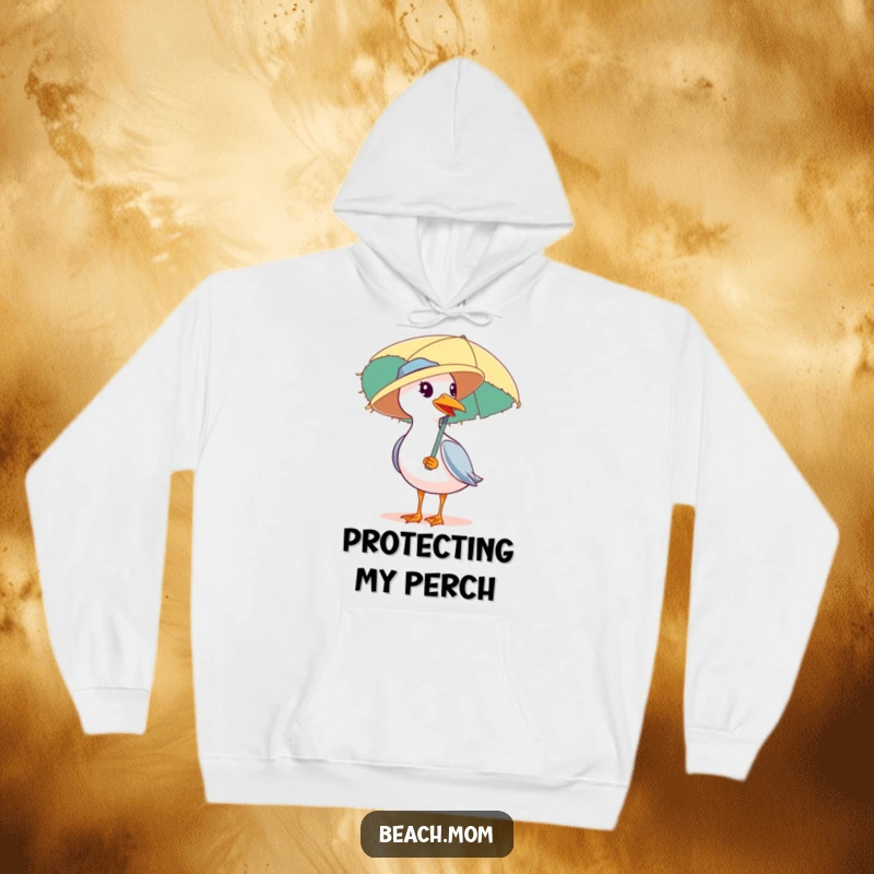 Funny hoodie illustrating a seagull wearing a straw hat and carrying a beach umbrella, ready for a relaxing day by the ocean.