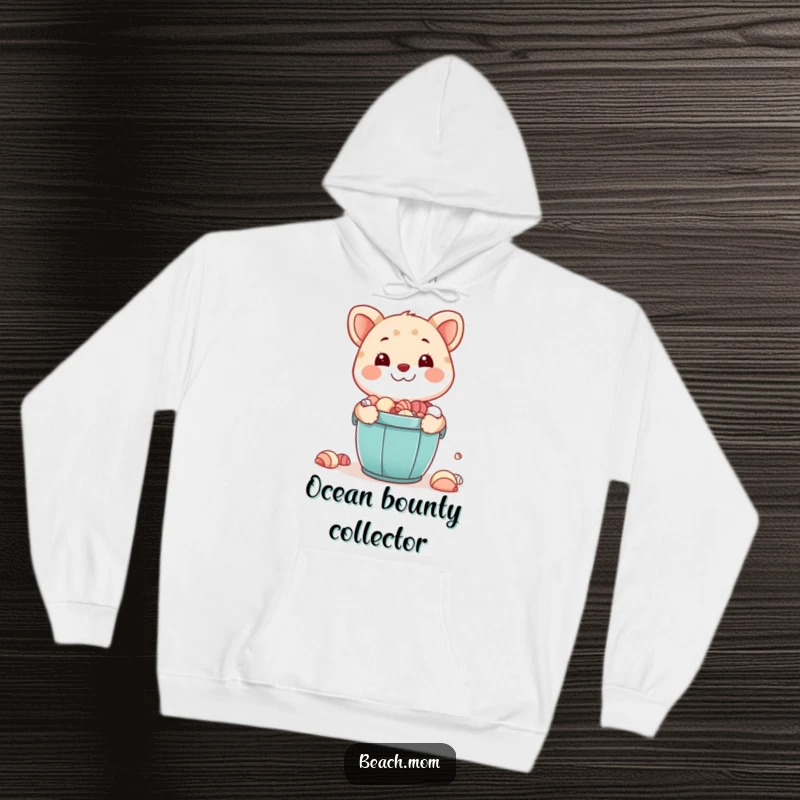Funny hoodie: A happy animal character proudly displays a bucket filled with seashells, embodying the joy of beachcombing.