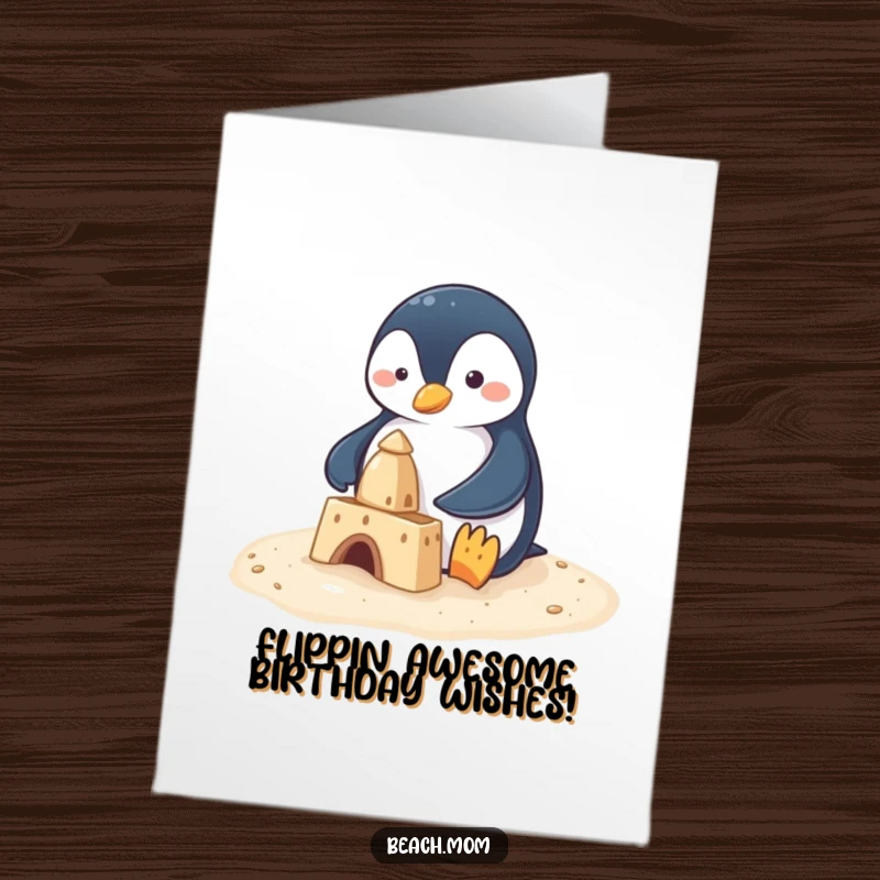 Funny Free Printable Birthday Card featuring a determined penguin with tiny flippers, happily building a sandcastle on a sunny beach.