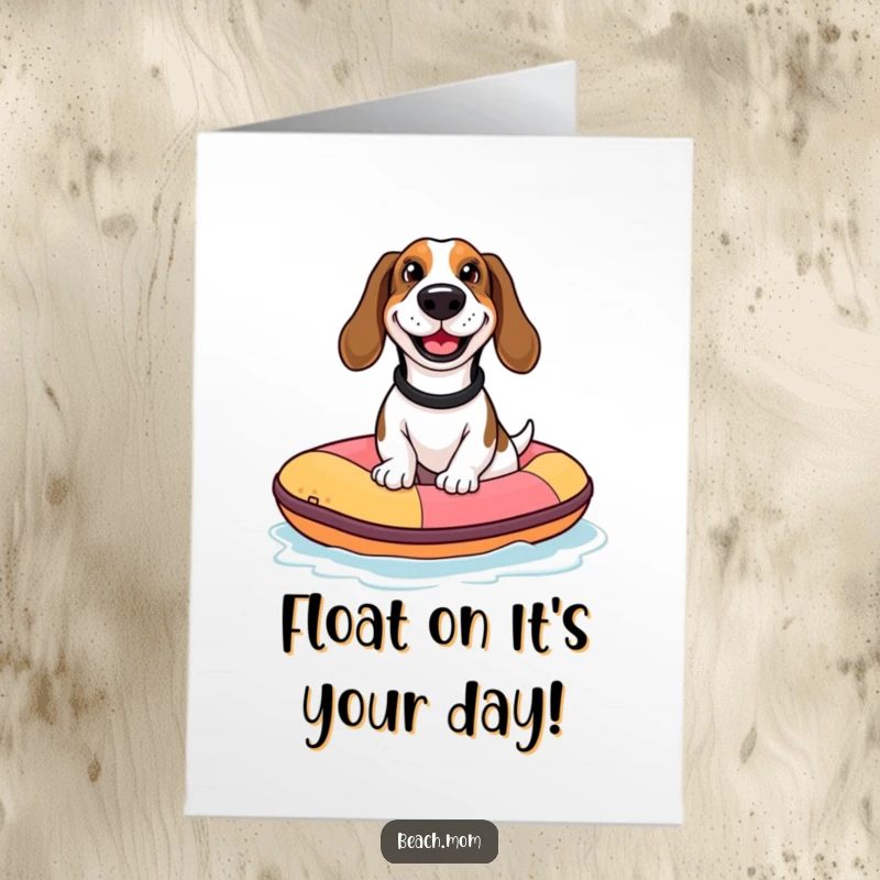 Funny Free Printable Birthday Card: Basset hound with a goofy grin rides a tiny inflatable raft with pure joy.