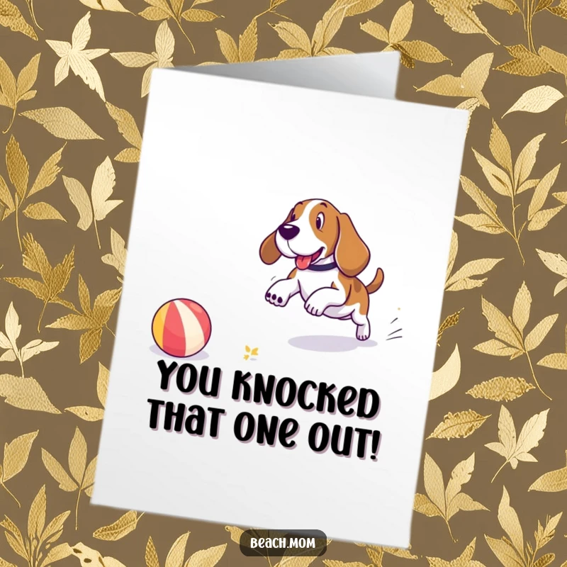 Funny Free Printable Congratulations Card: A Basset Hound playfully chasing a beach ball on the shore, celebrating a win with glee.