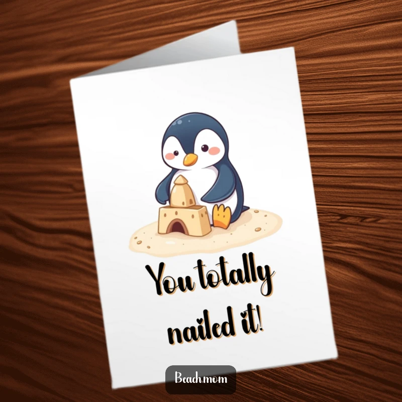 Funny Free Printable Congratulations Card showing a cute penguin proudly completing a sandcastle with its little flippers.