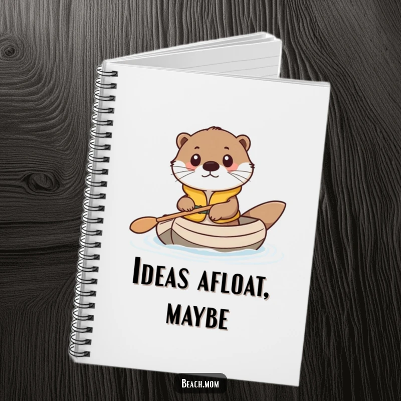 Funny notebook with a cute otter in a life vest, paddling a raft, perfect for jotting down notes and ideas.