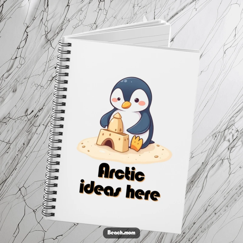 Funny penguin with tiny flippers focused on building a sandcastle, featured on a notebook cover, encouraging creative jotting.