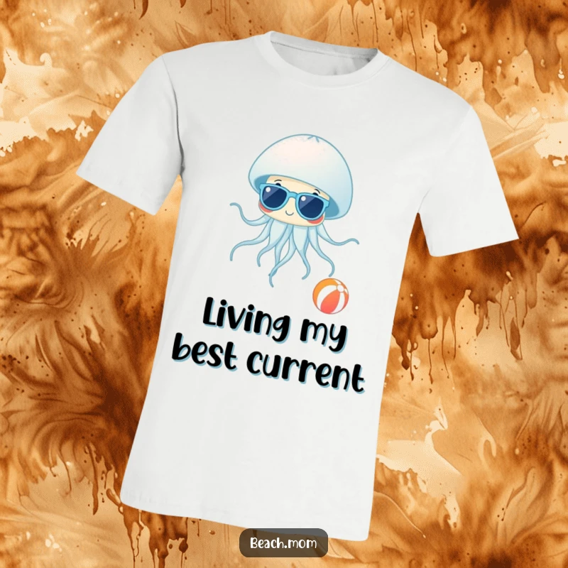 Funny Jellyfish Shades T-Shirt: A graphic tee featuring a jellyfish wearing sunglasses near a beach ball, perfect for funny beach outings.