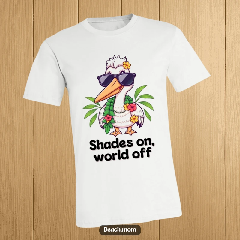Funny t-shirt showcasing a pelican in sunglasses and a lei, smiling, perfect for beach trips and casual wear.