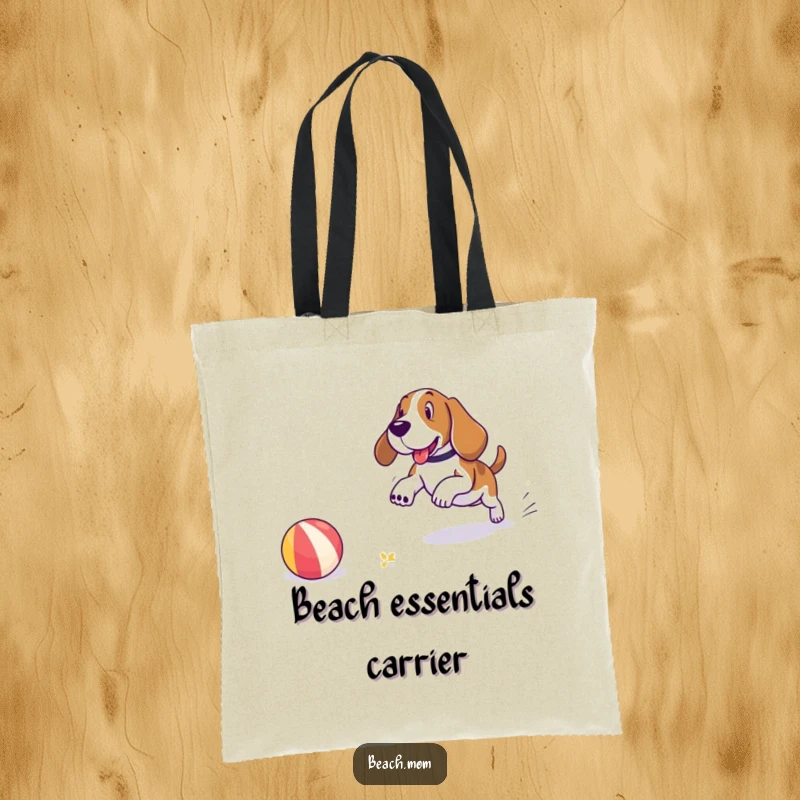 Funny Basset Hound tote bag showing a dog playfully chasing a beach ball on the sand, with the ocean waves gently rolling in.
